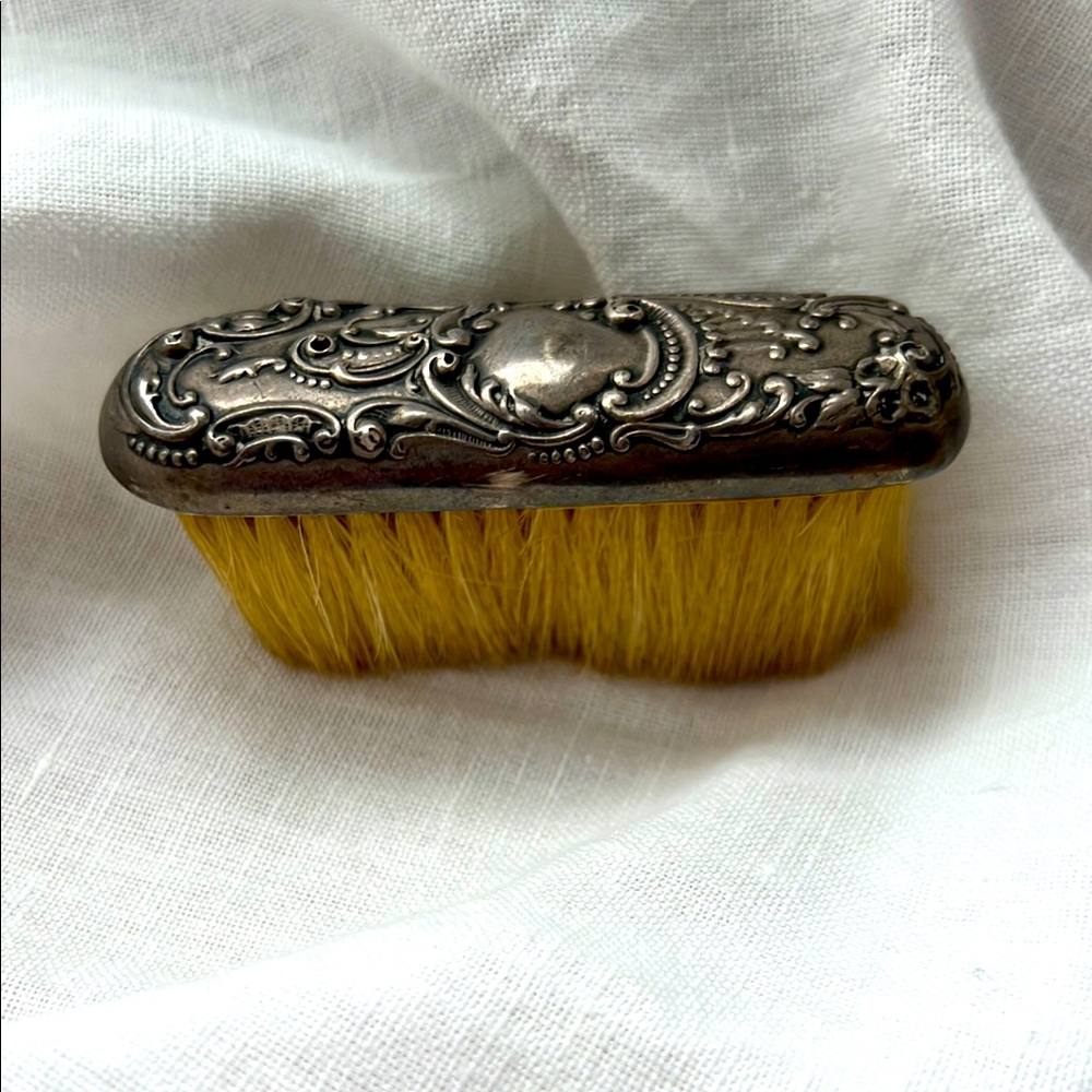 Ornate Sterling Silver clothes brush